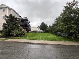 131 Stewart Street, Unit 2 Fall River, MA 02720 - Photo 14 of 16 a view of backyard with green space