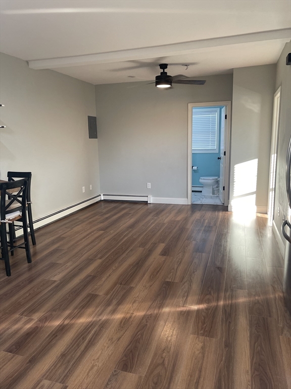 131 Stewart Street, Unit 2 Fall River, MA 02720 - Photo 4 of 16 a view of a livingroom with wooden floor