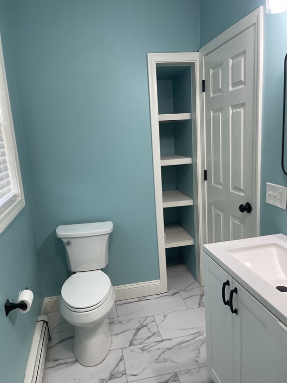131 Stewart Street, Unit 2 Fall River, MA 02720 - Photo 8 of 16 a bathroom with a toilet