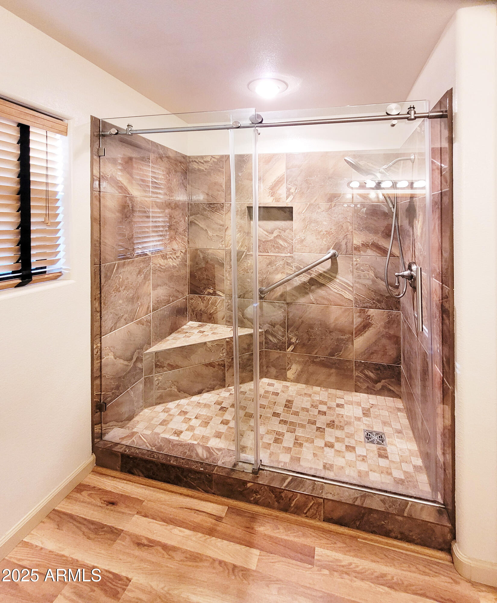 5579 Solitude Trail Loop Pine, AZ 85544 - Photo 32 of 50 a bathroom with a shower