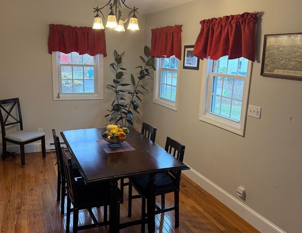 2 C Street Douglas, MA 01516 - Photo 11 of 27 a view of a dining room with furniture and chandelier