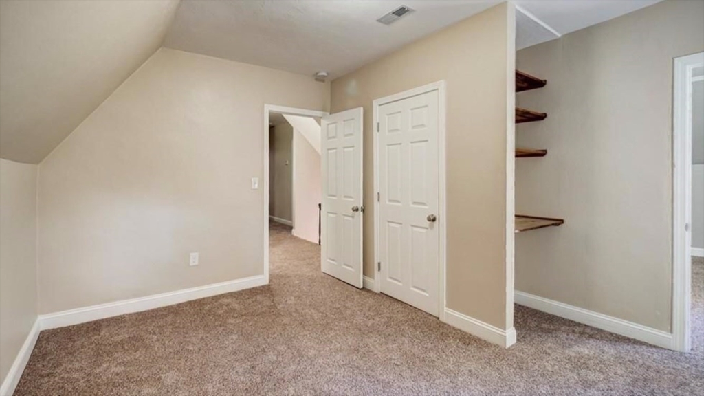 2 C Street Douglas, MA 01516 - Photo 17 of 27 an empty room with an entryway