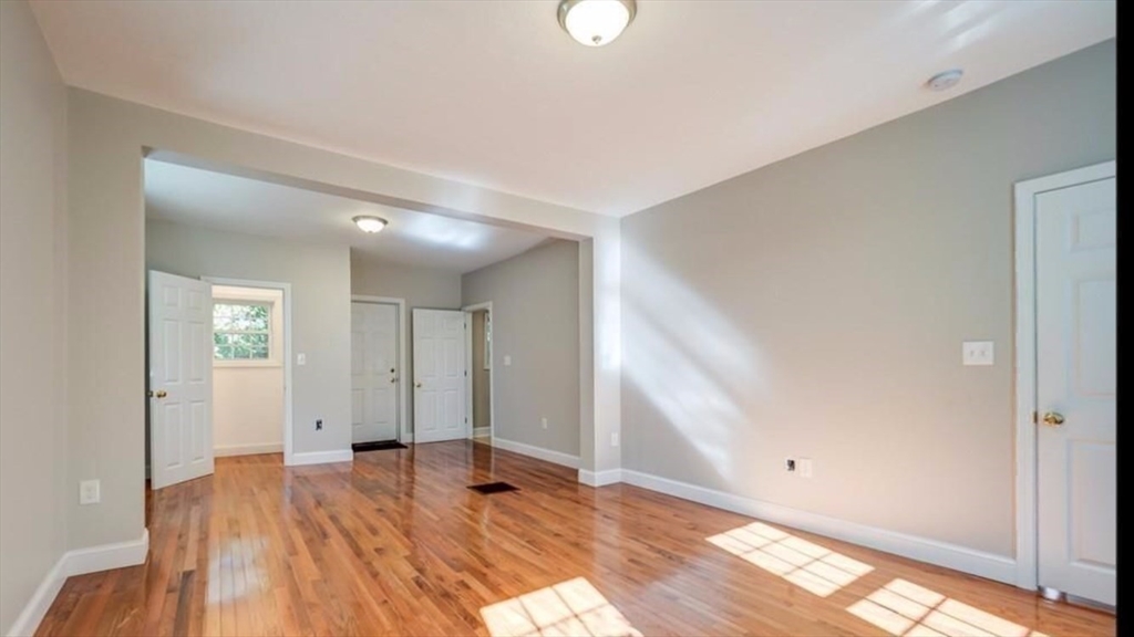 2 C Street Douglas, MA 01516 - Photo 21 of 27 a view of empty room with wooden floor