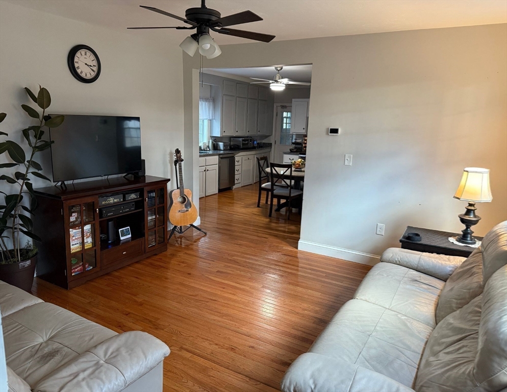 2 C Street Douglas, MA 01516 - Photo 22 of 27 a living room with furniture and a flat screen tv