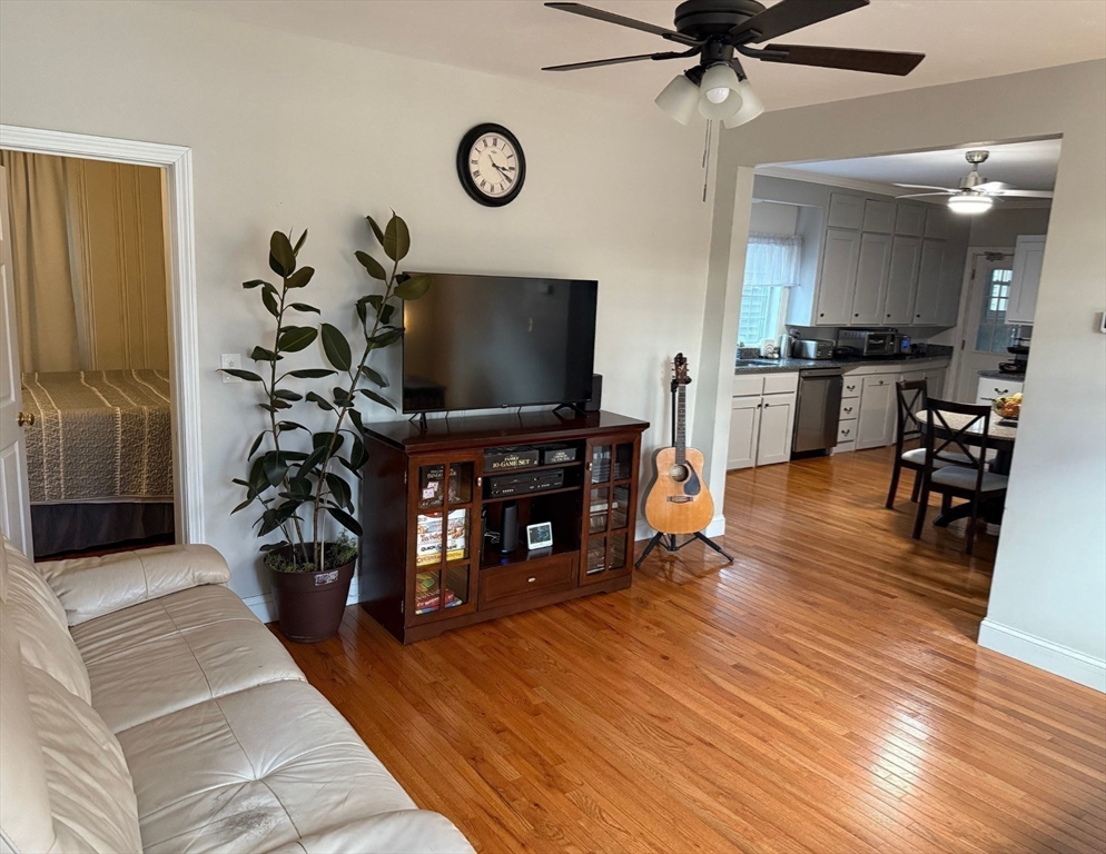 2 C Street Douglas, MA 01516 - Photo 23 of 27 a living room with furniture and a flat screen tv