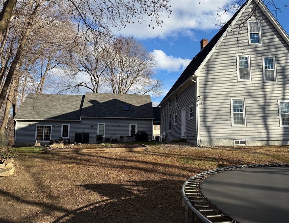 2 C Street Douglas, MA 01516 - Photo 3 of 27 a front view of a house with a yard