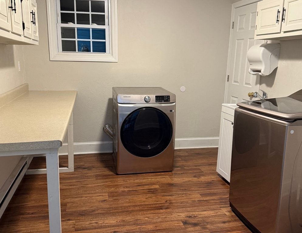 2 C Street Douglas, MA 01516 - Photo 9 of 27 a view of a kitchen with washer and dryer