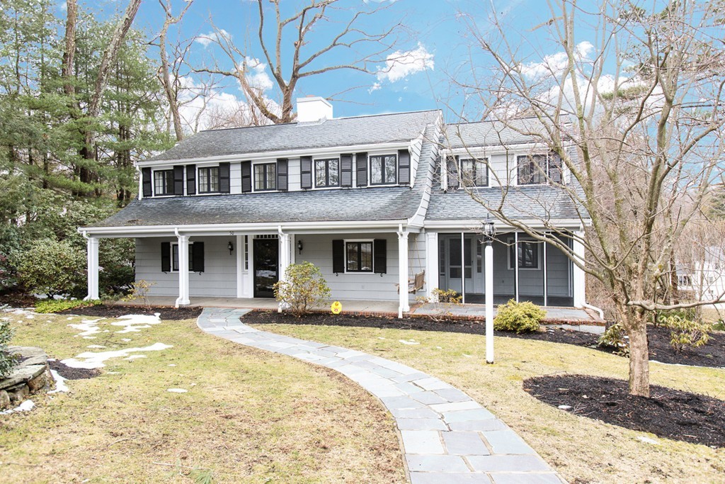 50 Lincoln Road Wellesley, MA 02481 - Photo 1 of 16 a front view of a building with a garden