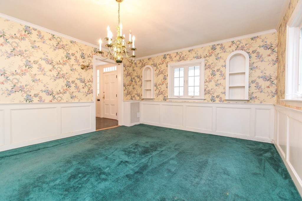 50 Lincoln Road Wellesley, MA 02481 - Photo 11 of 16 a view of a big room with windows and chandelier fan