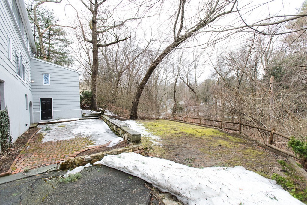 50 Lincoln Road Wellesley, MA 02481 - Photo 12 of 16 a view of a backyard with white fence