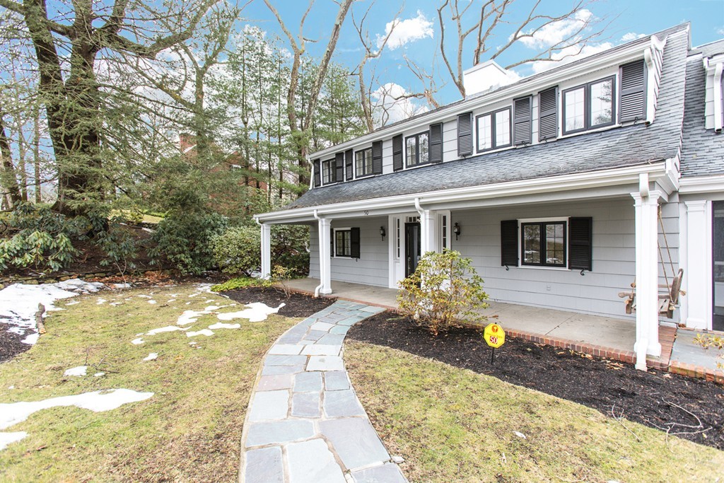 50 Lincoln Road Wellesley, MA 02481 - Photo 3 of 16 a front view of a house with swimming pool