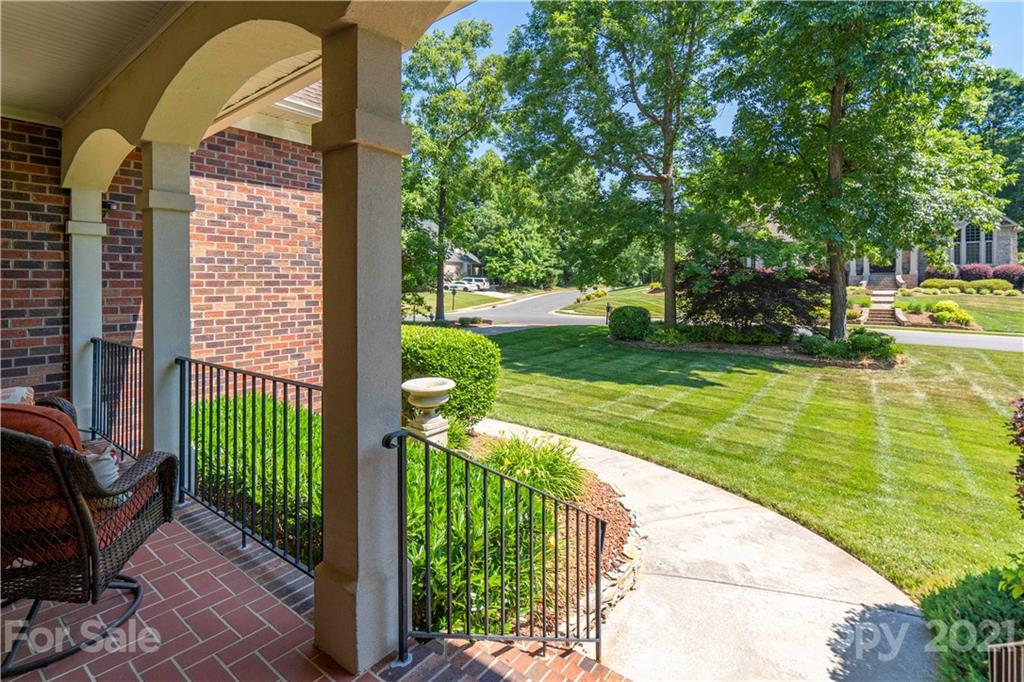 6607 Fox Ridge Circle Davidson, NC 28036 - Photo 2 of 48 a view of a garden from a balcony