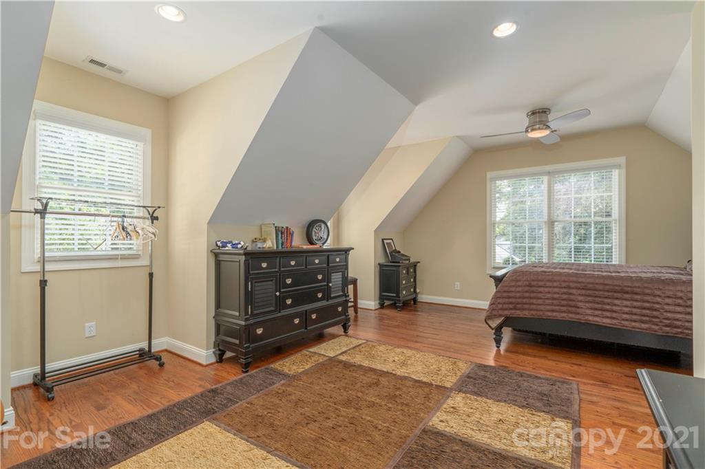 6607 Fox Ridge Circle Davidson, NC 28036 - Photo 38 of 48 a bedroom with a bed and a window