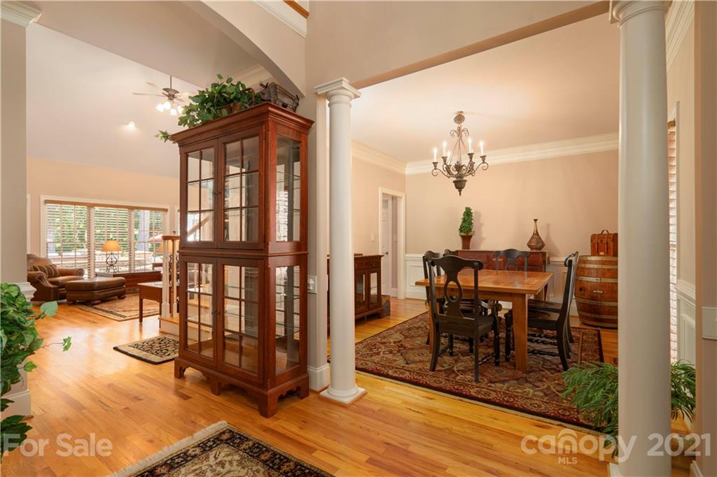6607 Fox Ridge Circle Davidson, NC 28036 - Photo 5 of 48 a view of a dining room with furniture and a chandelier