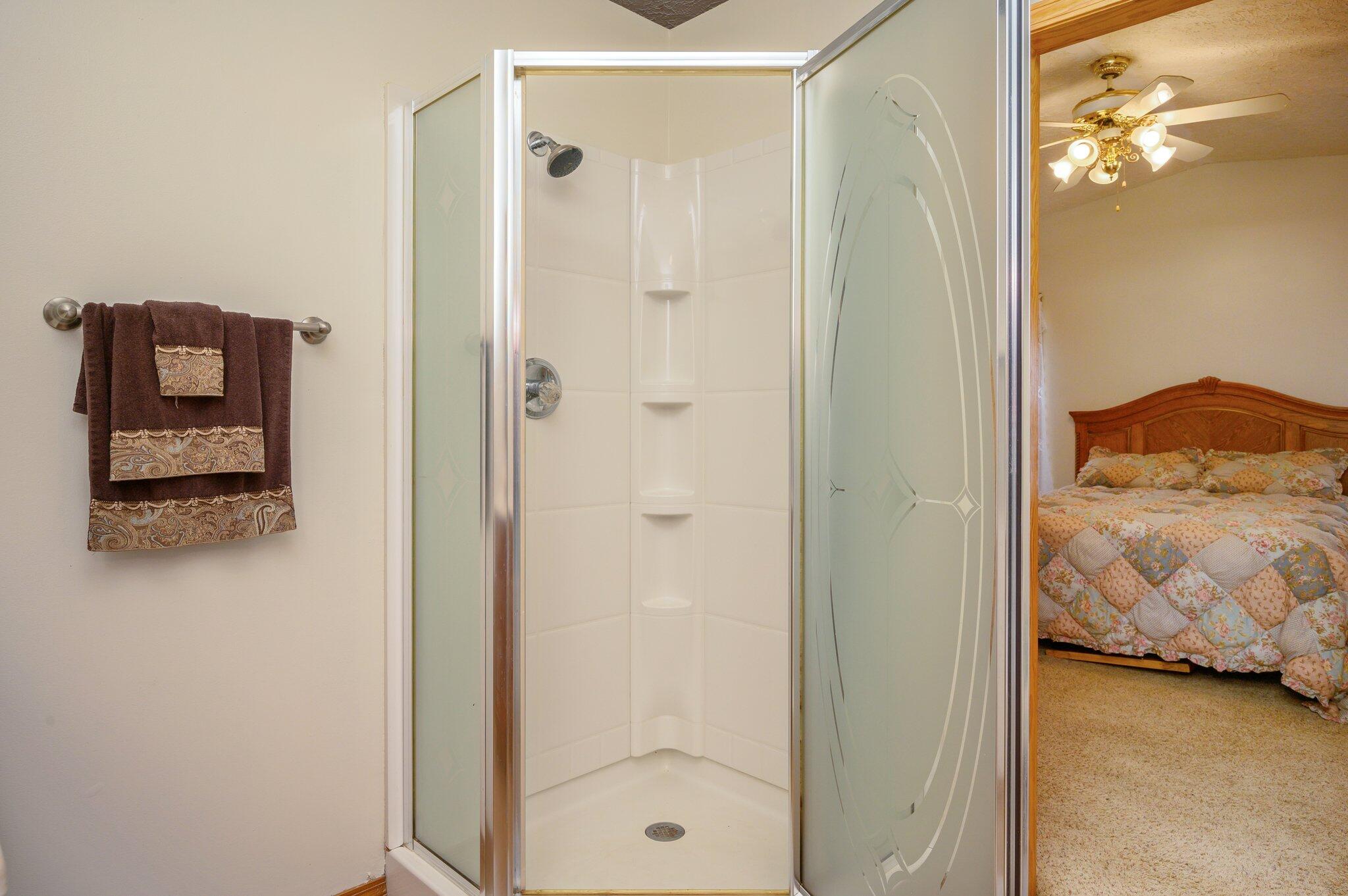 52 Tulip Avenue DeFuniak Springs, FL 32433 - Photo 14 of 34 a bathroom with a shower