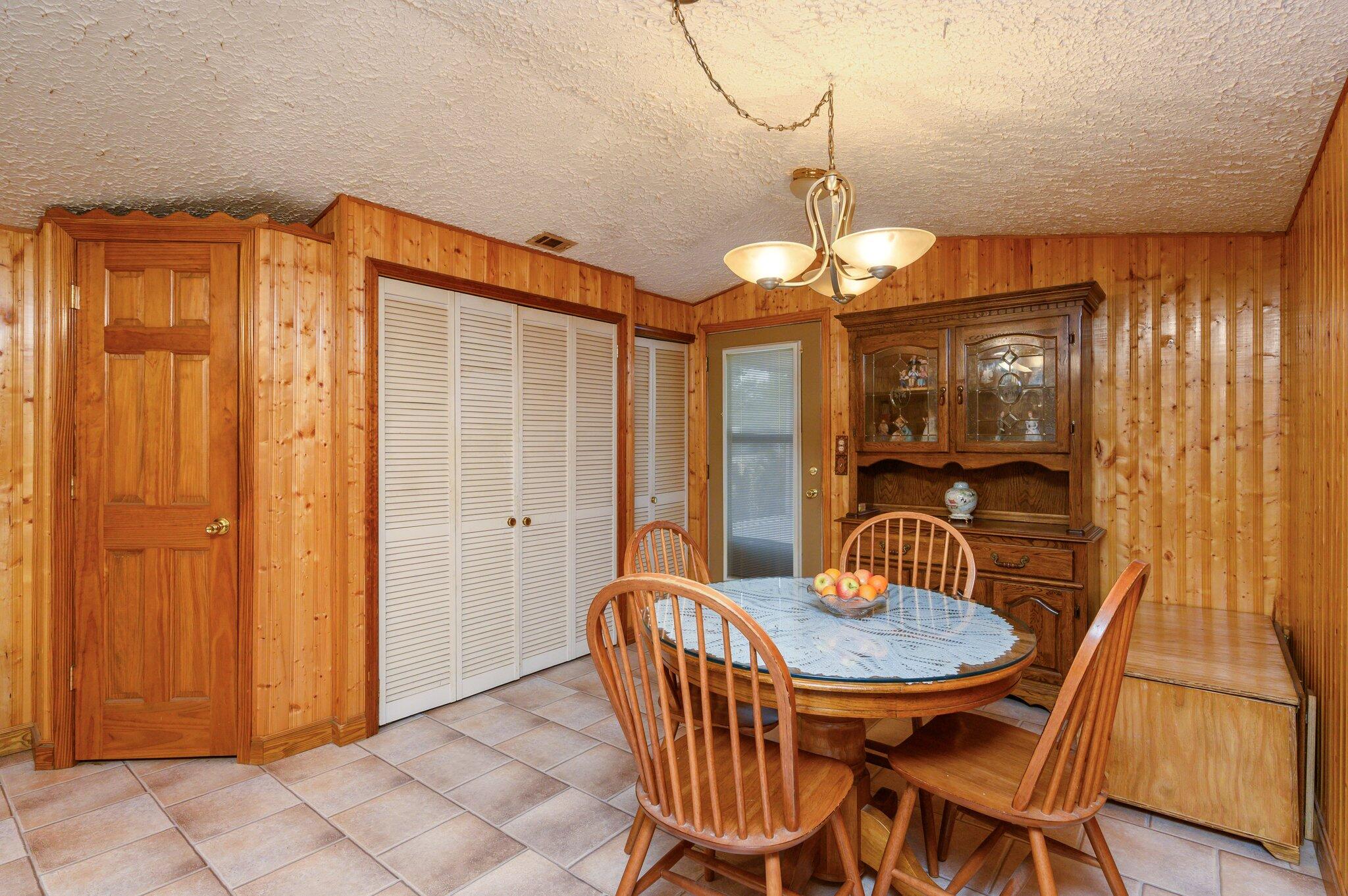 52 Tulip Avenue DeFuniak Springs, FL 32433 - Photo 19 of 34 a dining room with furniture and window