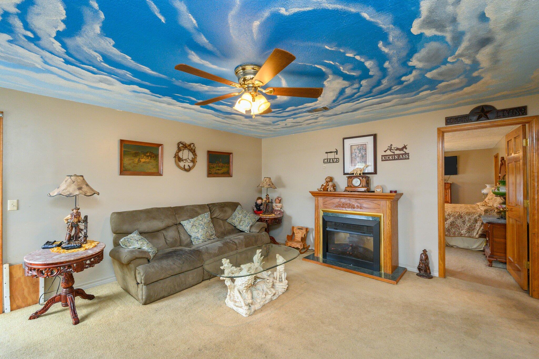 52 Tulip Avenue DeFuniak Springs, FL 32433 - Photo 27 of 34 a living room with furniture and a fireplace