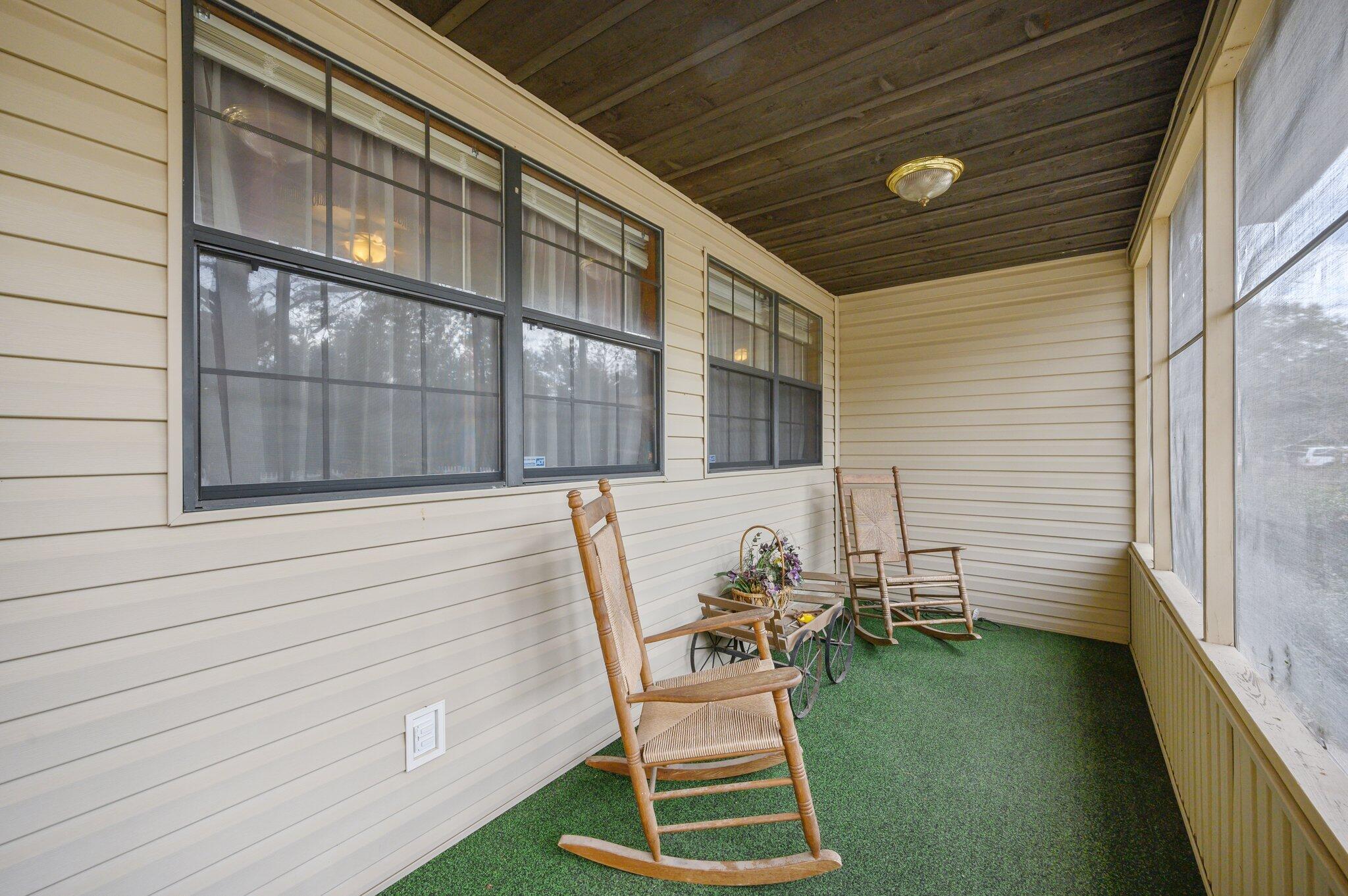 52 Tulip Avenue DeFuniak Springs, FL 32433 - Photo 31 of 34 a view of two chairs in the balcony