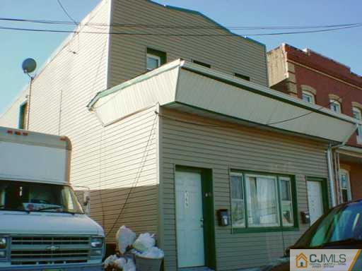 369 Grove Street Perth Amboy, NJ 08861 - Photo 2 of 2 a view of a back yard of the house