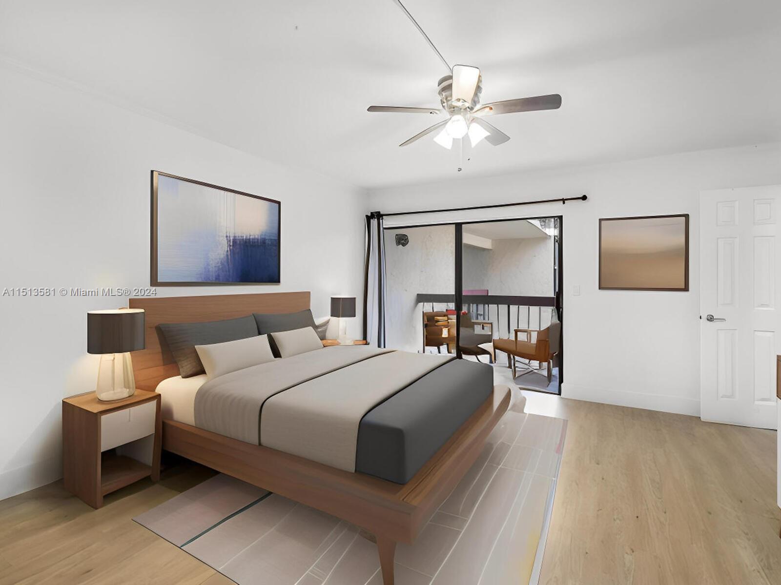 2430 Brickell Avenue, Unit 105A Miami, FL 33129 - Photo 15 of 27 a bedroom with bed and window