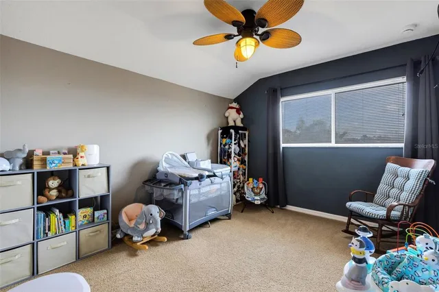 a bedroom with a workspace