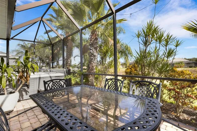 a view of swimming pool with a patio and a yard