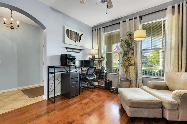 a living room with furniture and a window