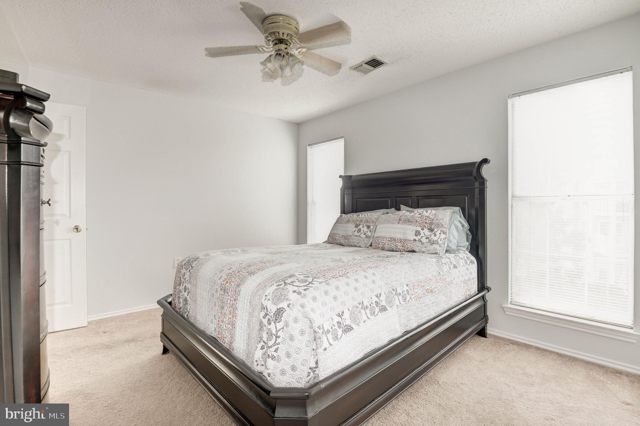 20979 Timber Ridge Terrace, Unit 303 Ashburn, VA 20147 - Photo 12 of 23 Master bedroom