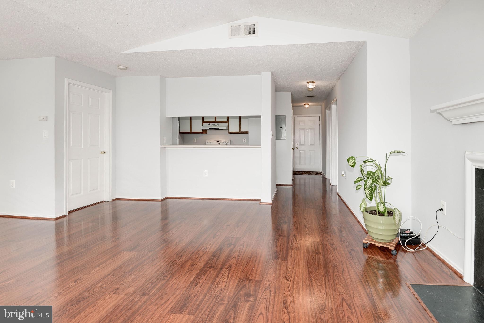 20979 Timber Ridge Terrace, Unit 303 Ashburn, VA 20147 - Photo 5 of 23 Living room area