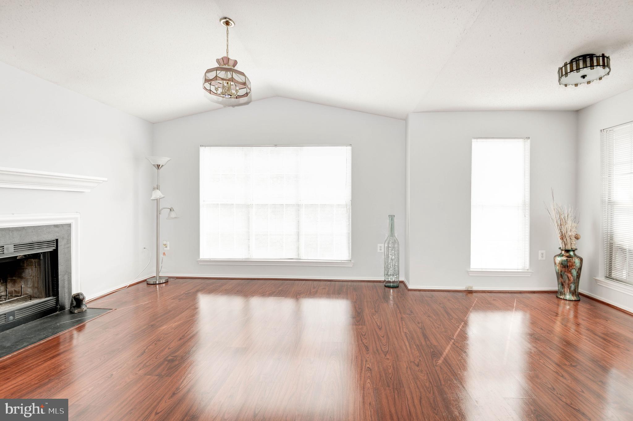 20979 Timber Ridge Terrace, Unit 303 Ashburn, VA 20147 - Photo 7 of 23 Living room area