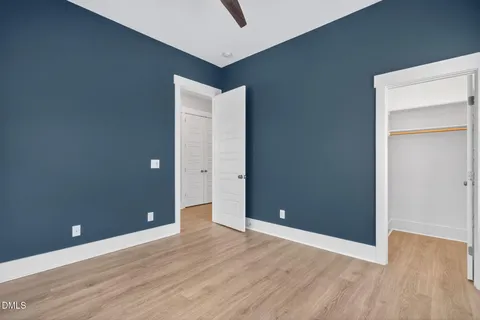 a kitchen with a sink and a rug