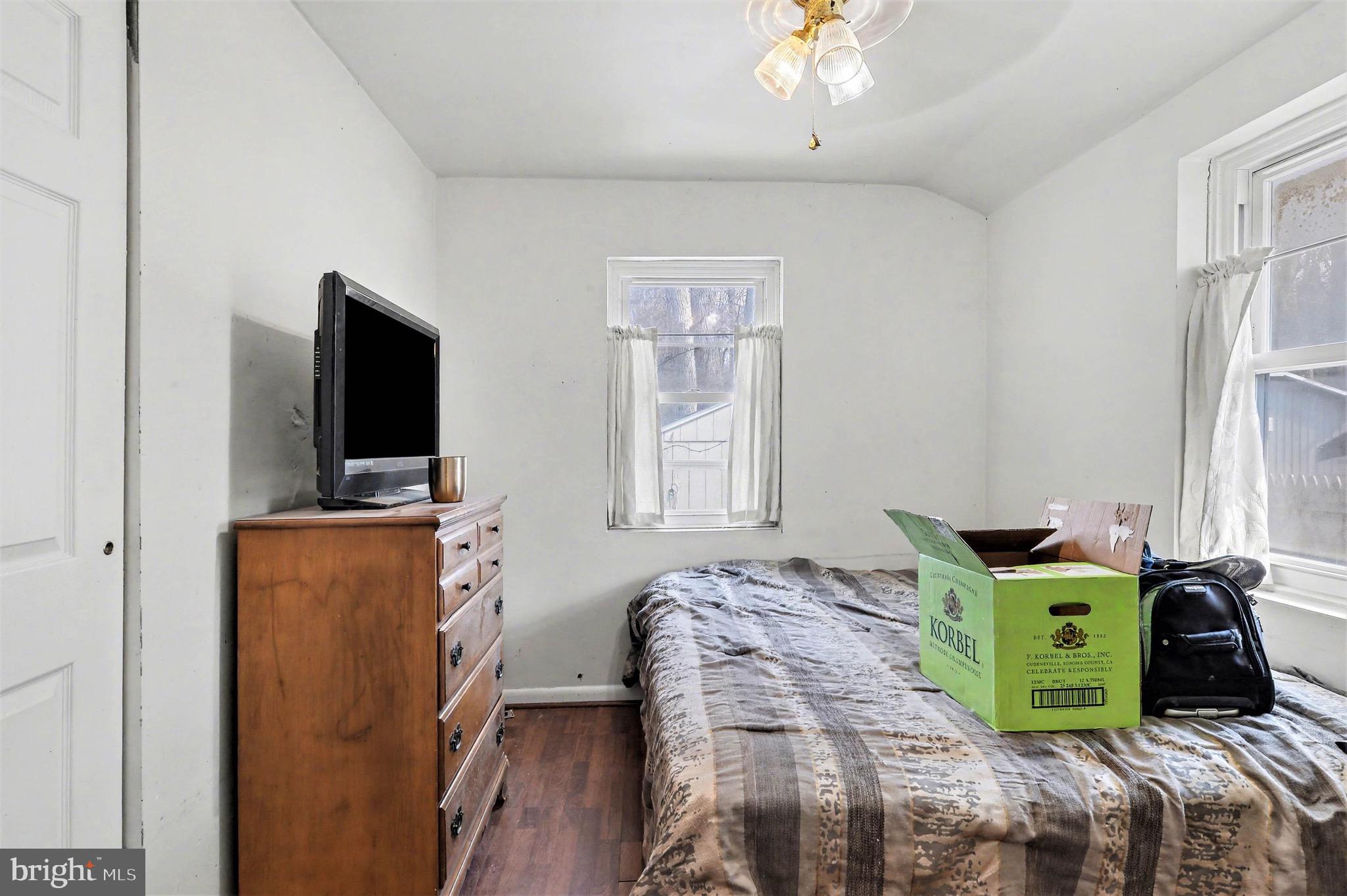 1220 Shesley Road Edgewater, MD 21037 - Photo 13 of 22 a bedroom with bed and flat screen tv