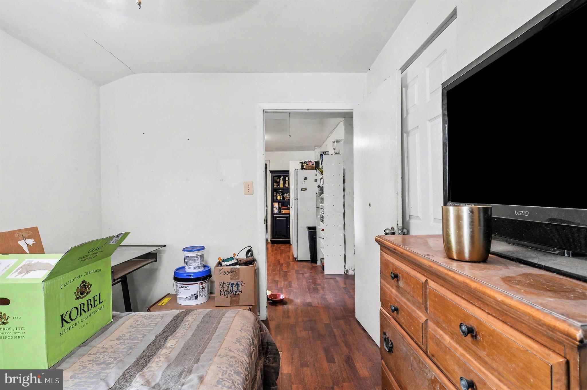 1220 Shesley Road Edgewater, MD 21037 - Photo 14 of 22 a room with a bed and a flat screen tv