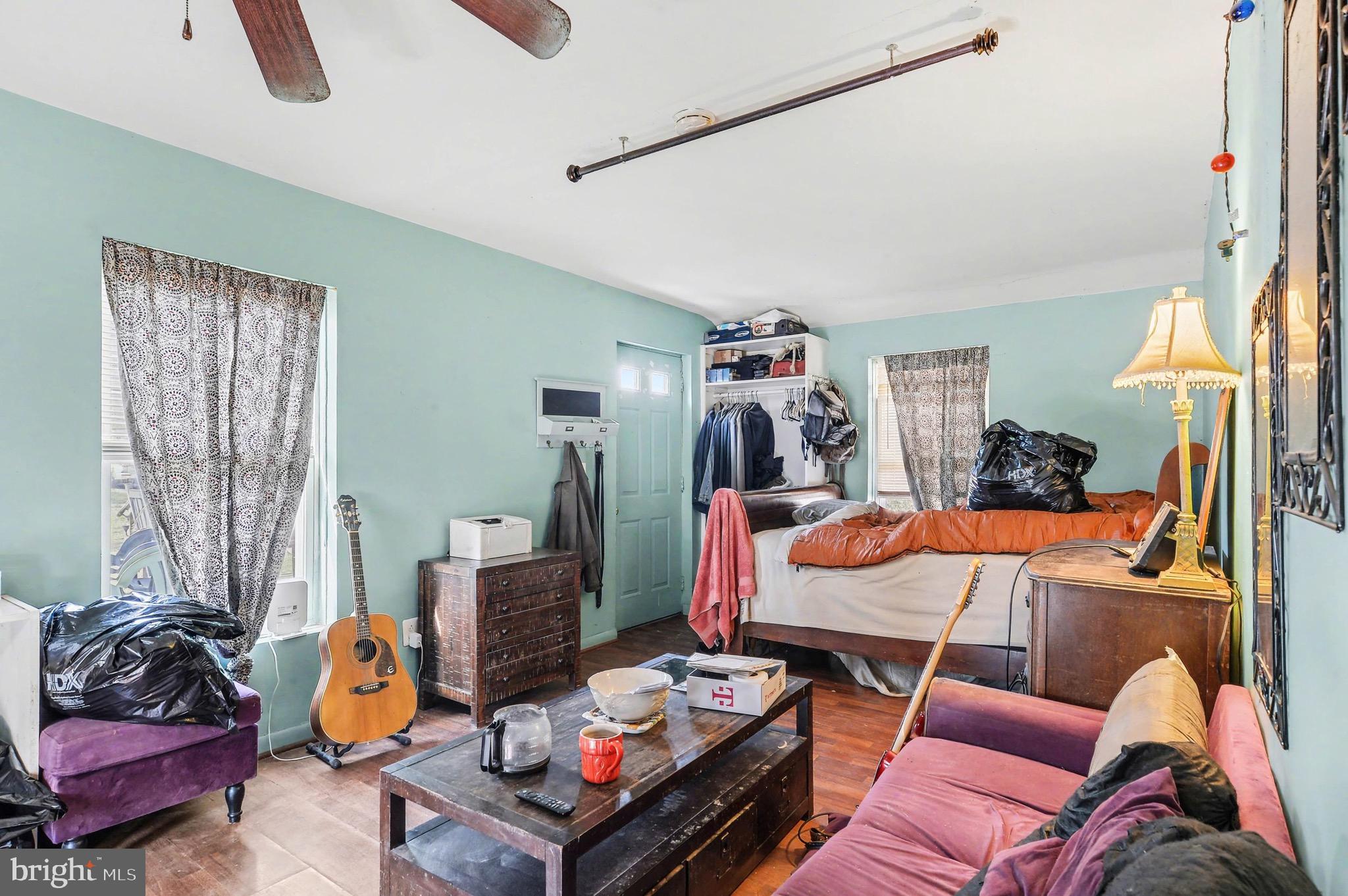 1220 Shesley Road Edgewater, MD 21037 - Photo 4 of 22 a living room with furniture and wooden floor