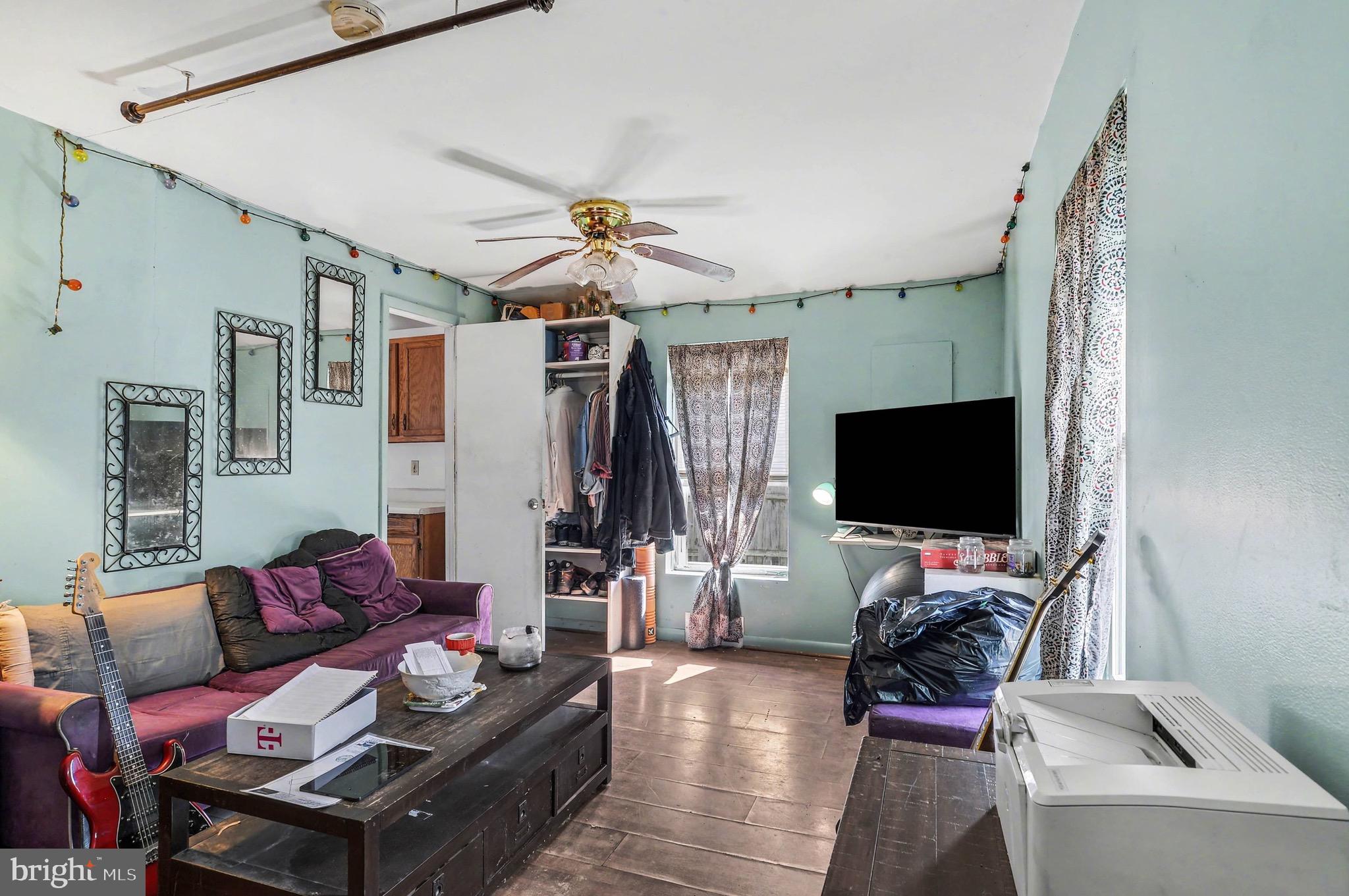 1220 Shesley Road Edgewater, MD 21037 - Photo 5 of 22 a living room with furniture and a flat screen tv