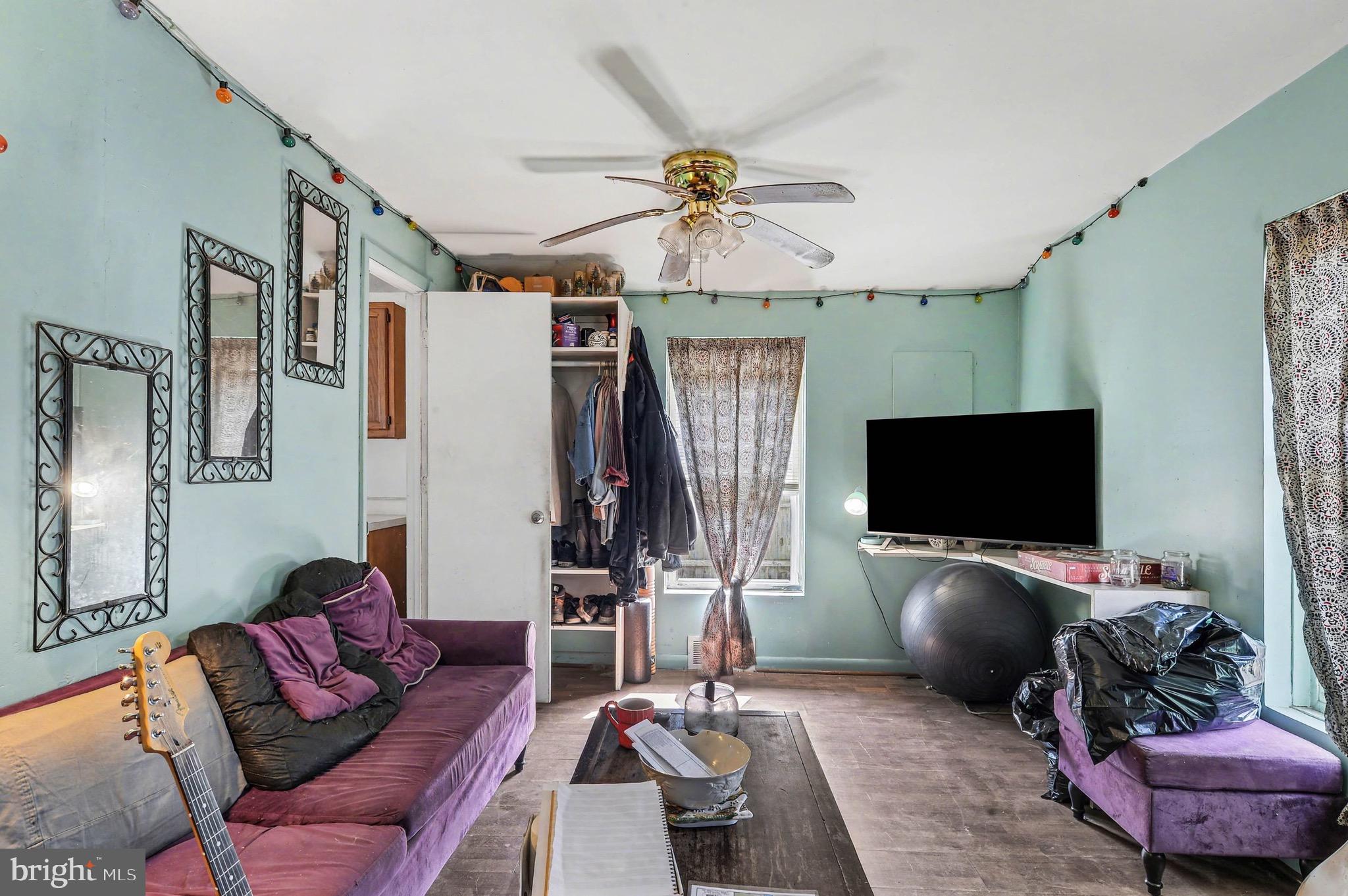 1220 Shesley Road Edgewater, MD 21037 - Photo 6 of 22 a living room with furniture and a flat screen tv