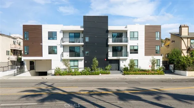 a front view of a multi story building