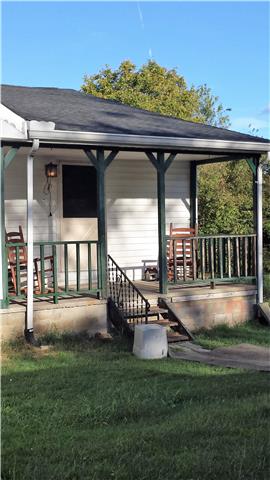 290 Cottage Home Road Liberty, TN 37095 - Photo 10 of 15 a view of patio with a table chairs and a yard
