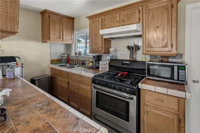 a bathroom with a sink and mirror