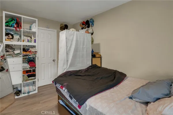 a room that has a bed and a closet