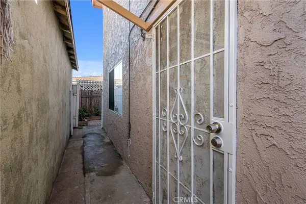 a bedroom with a bed and cabinets