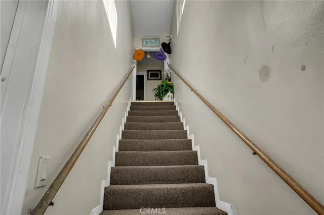 a bedroom with a bed and a closet