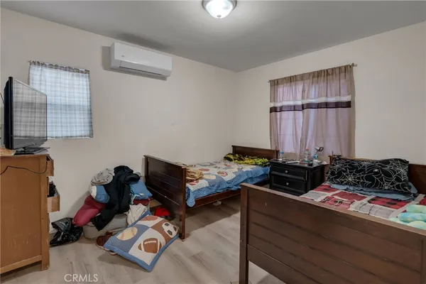 a kitchen with a stove and a refrigerator