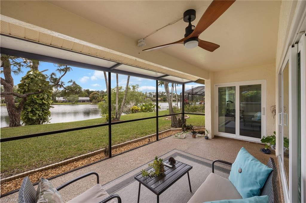 1324 Monarch Circle Naples, FL 34116 - Photo 19 of 23 a living room with large window
