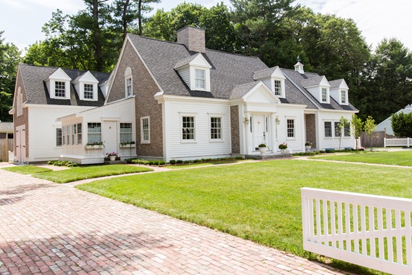 6 Bay State Road Wellesley, MA 02481 - Photo 1 of 18 a front view of a house with a garden