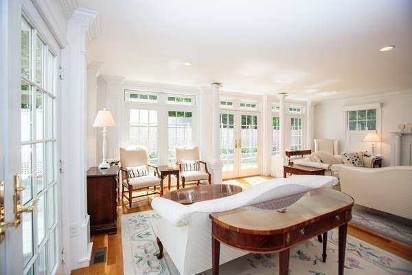 6 Bay State Road Wellesley, MA 02481 - Photo 8 of 18 a living room with fireplace furniture and a large window
