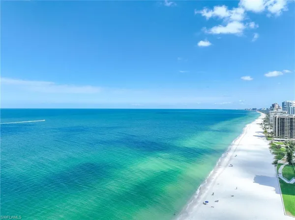 a view of an ocean with a big yard