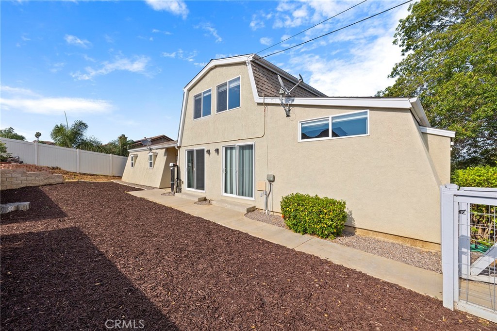 410 Palomino Road Fallbrook, CA 92028 - Photo 12 of 25 a front view of a house with a yard