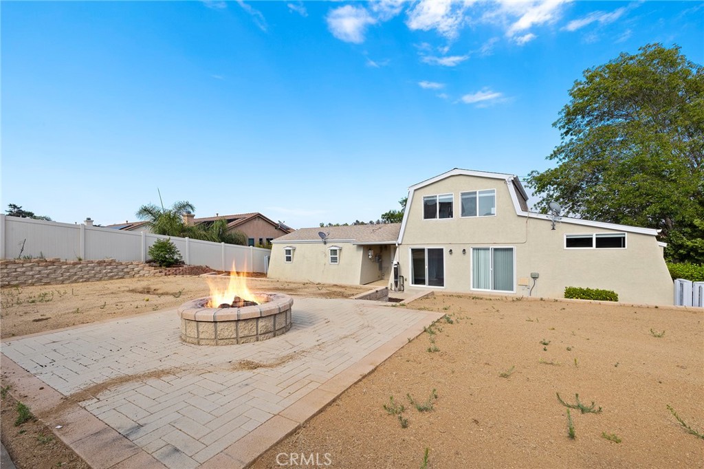 410 Palomino Road Fallbrook, CA 92028 - Photo 15 of 25 a front view of a house with a yard