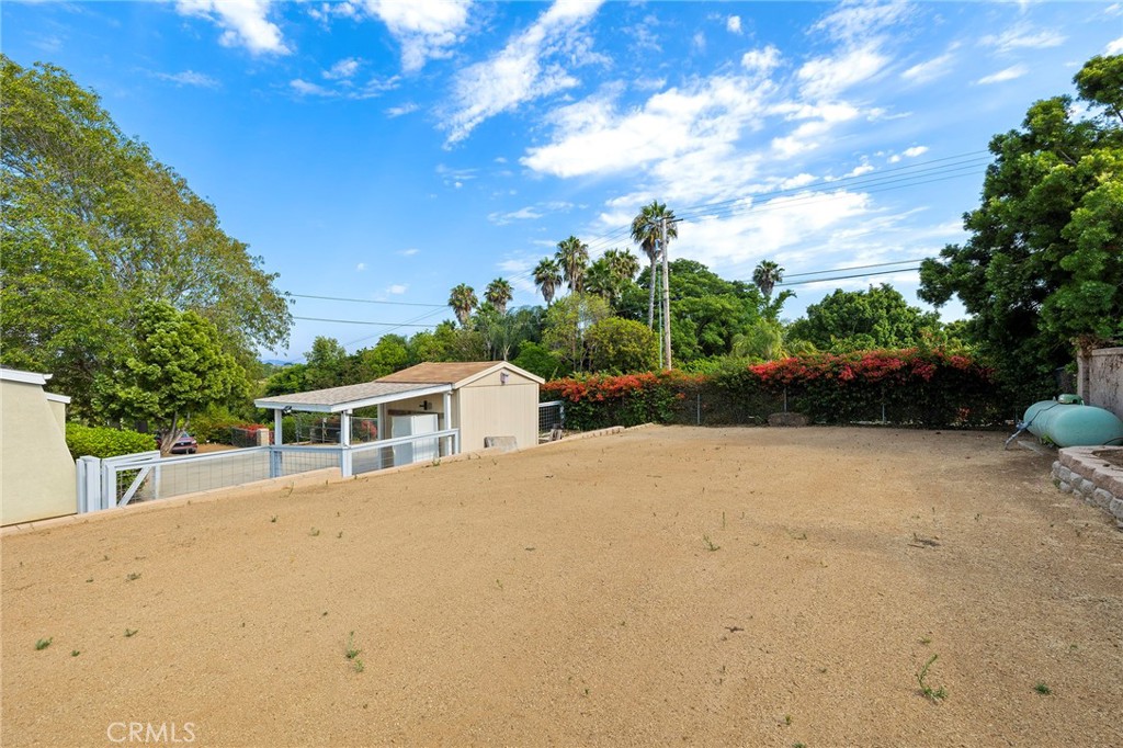 410 Palomino Road Fallbrook, CA 92028 - Photo 16 of 25 a house with a yard